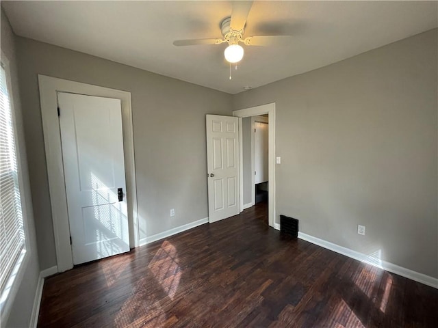 4916 Wabash Ave, Kansas City, MO 64130 - unfurnished bedroom with wood finished floors and a ceiling fan
