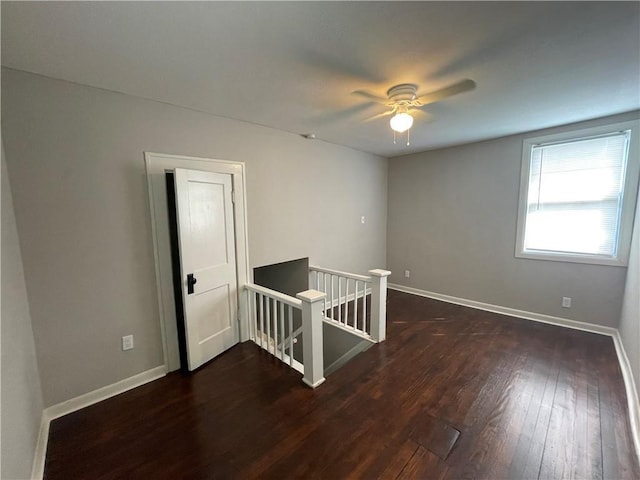 4916 Wabash Ave, Kansas City, MO 64130 - unfurnished room with dark wood-style flooring and a ceiling fan