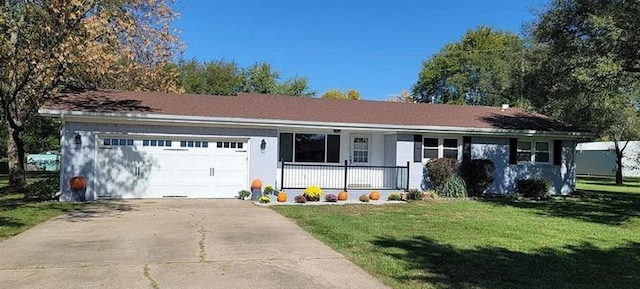 1878 US Highway 54, Iola, KS 66749 - ranch-style house with an attached garage, a porch, a front yard, and driveway