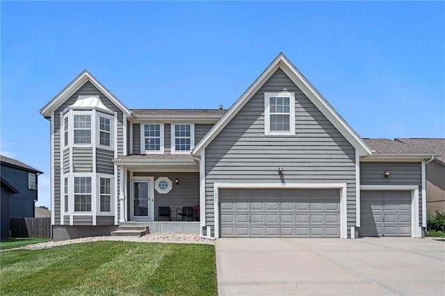 1202 SW Nagona Ln, Lees Summit, MO 64082 - traditional-style home featuring concrete driveway and an attached garage