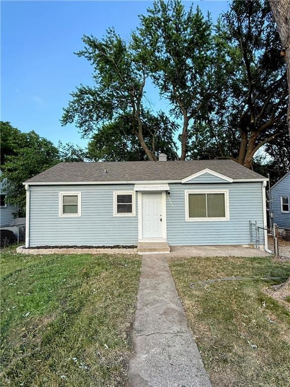 2321 Englewood Ct, Independence, MO 64052 - view of front of house with a shingled roof