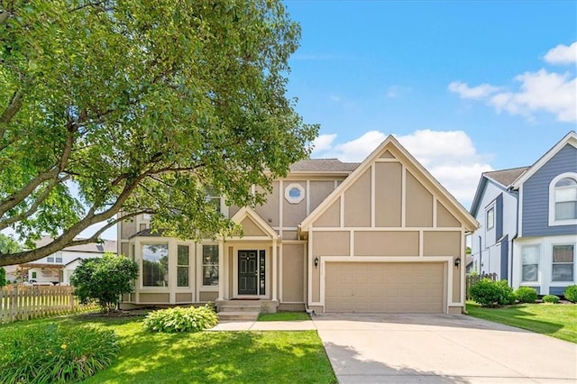 6715 W 148th Ter, Overland Park, KS 66223 - tudor house with concrete driveway, stucco siding, and an attached garage
