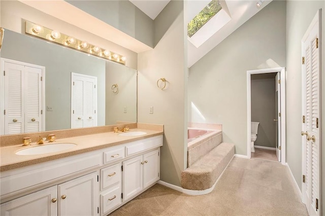 11909 Goddard St, Overland Park, KS 66213 - full bath featuring a closet, double vanity, and a garden tub