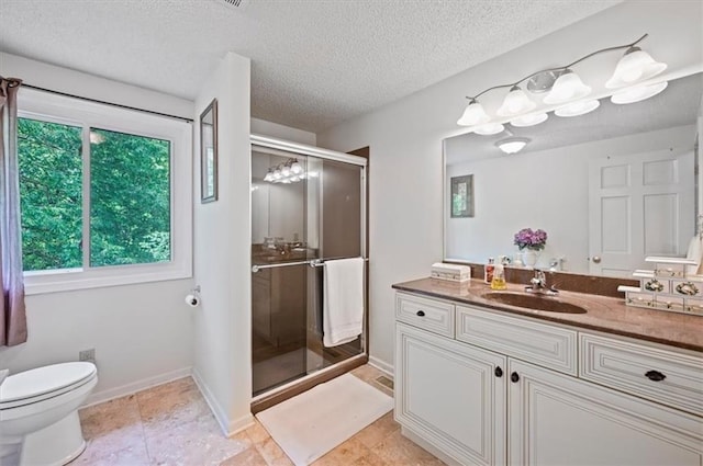 1621 Vilas St, Leavenworth, KS 66048 - full bathroom with a stall shower, vanity, a textured ceiling, and tile patterned flooring
