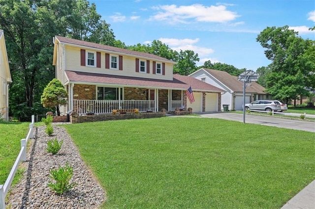 1621 Vilas St, Leavenworth, KS 66048 - view of front of home with a porch, a garage, driveway, and a front yard