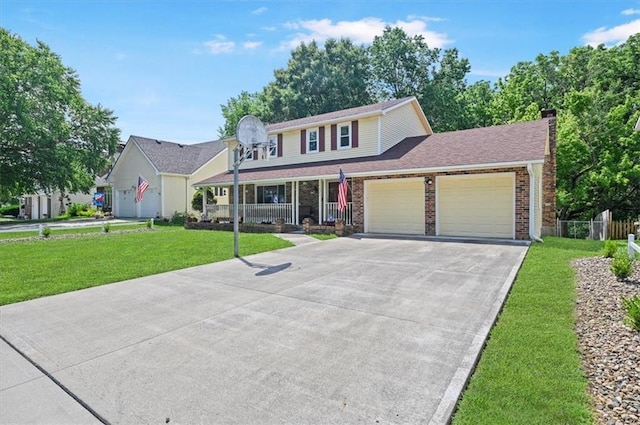 1621 Vilas St, Leavenworth, KS 66048 - traditional-style house with a garage, driveway, covered porch, a chimney, and brick siding