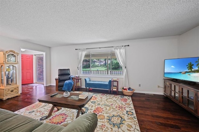 1621 Vilas St, Leavenworth, KS 66048 - living room with wood finished floors and a textured ceiling