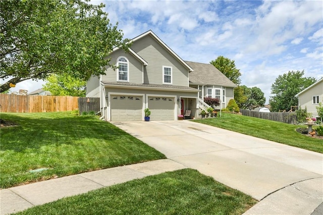 407 Maple Ct, Lansing, KS 66043 - view of front of property featuring concrete driveway and a garage