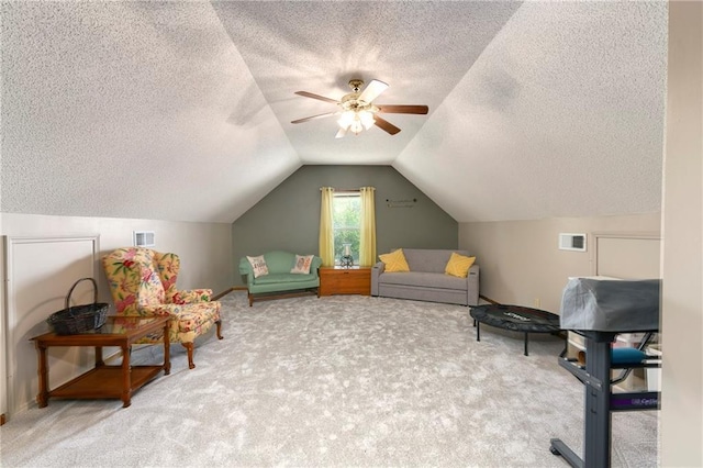 407 Maple Ct, Lansing, KS 66043 - living area with a textured ceiling, carpet, lofted ceiling, and ceiling fan