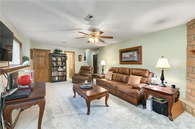 407 Maple Ct, Lansing, KS 66043 - carpeted living room with a ceiling fan