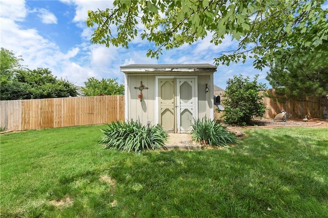 407 Maple Ct, Lansing, KS 66043 - view of shed featuring a fenced backyard