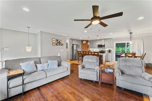 10708 E 301st St, Drexel, MO 64742 - living room with ornamental molding, ceiling fan, dark wood-type flooring, and recessed lighting