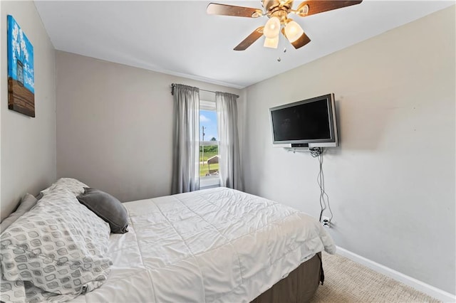 10708 E 301st St, Drexel, MO 64742 - carpeted bedroom with baseboards and ceiling fan