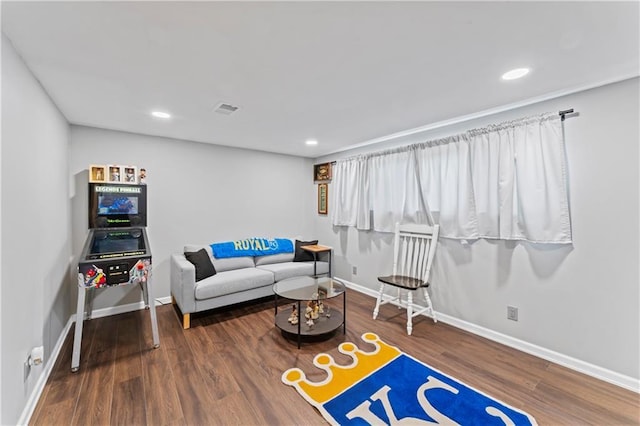 10708 E 301st St, Drexel, MO 64742 - living area with wood finished floors and recessed lighting