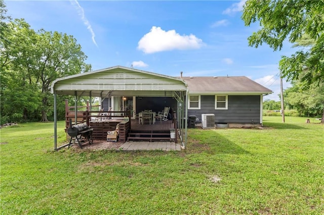 10708 E 301st St, Drexel, MO 64742 - rear view of house with a wooden deck and a lawn