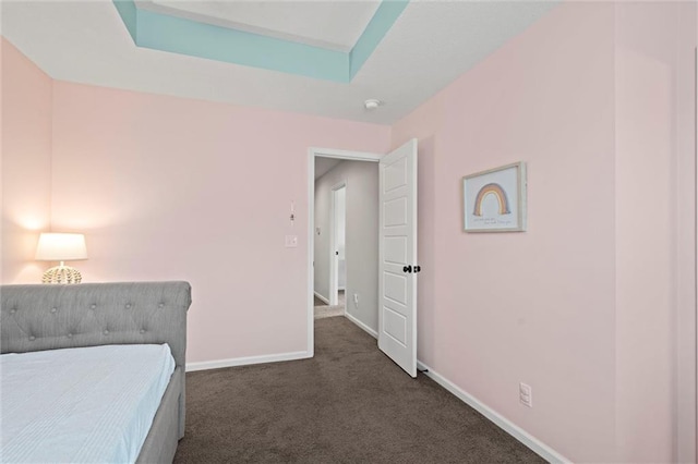 24957 W 98th St, Lenexa, KS 66227 - bedroom featuring dark colored carpet and baseboards