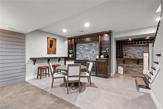 24957 W 98th St, Lenexa, KS 66227 - dining space featuring recessed lighting and stairs