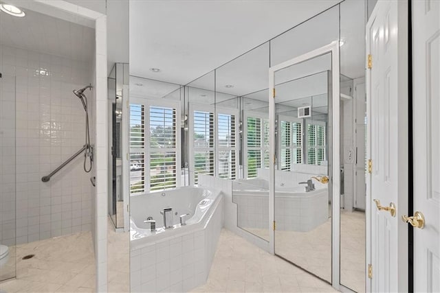 4328 W 110th St, Leawood, KS 66211 - full bath with a shower stall, a tub with jets, and recessed lighting