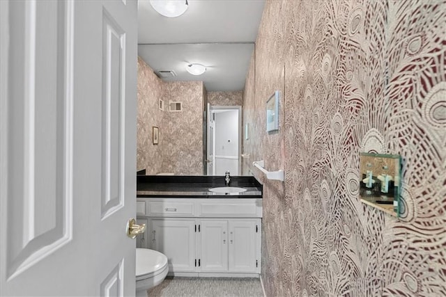 4328 W 110th St, Leawood, KS 66211 - bathroom featuring vanity and toilet