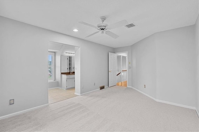 4328 W 110th St, Leawood, KS 66211 - unfurnished bedroom featuring light carpet, recessed lighting, a ceiling fan, and ensuite bathroom