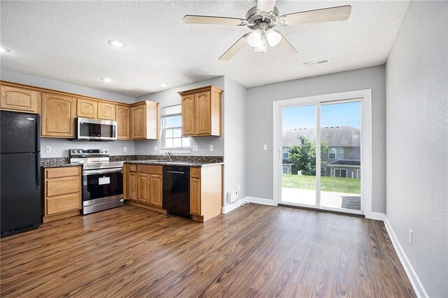 904 SW Peach Tree Ln, Blue Springs, MO 64064 - kitchen featuring black appliances, dark wood-style flooring, a textured ceiling, ceiling fan, and recessed lighting