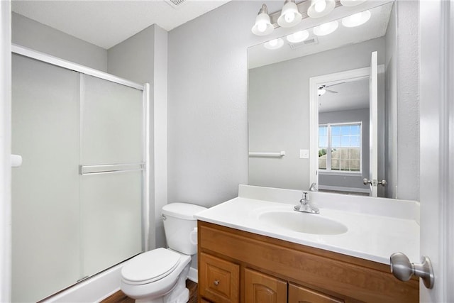 904 SW Peach Tree Ln, Blue Springs, MO 64064 - full bathroom featuring a stall shower, vanity, and a ceiling fan