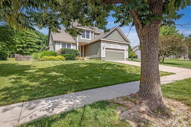 895 N Diane Dr, Olathe, KS 66061 - view of front of house with driveway and a garage