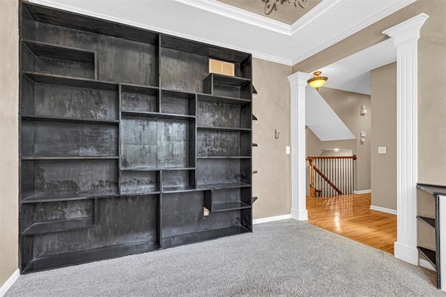 895 N Diane Dr, Olathe, KS 66061 - detailed view of decorative columns, carpet floors, crown molding, and wood finished floors
