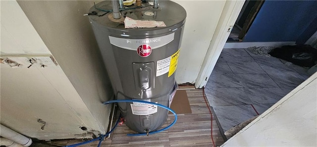 1223 S Delaware Ave, Independence, MO 64055 - utility room featuring electric water heater
