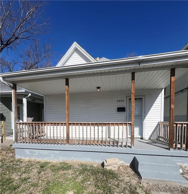 4432 E 10th St, Kansas City, MO 64127 - property entrance featuring covered porch