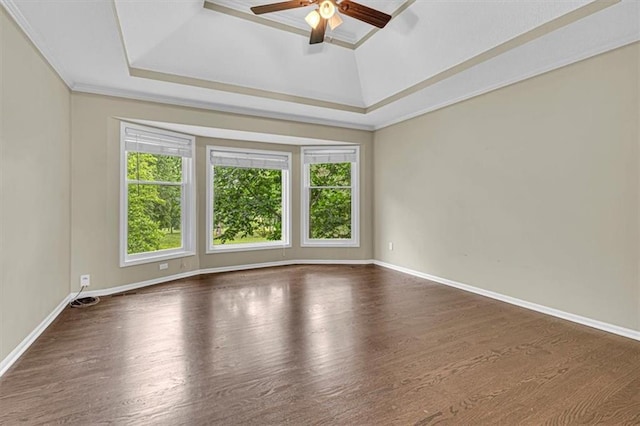 14440 W 187th Ter, Olathe, KS 66062 - empty room featuring ceiling fan, wood finished floors, a tray ceiling, and ornamental molding
