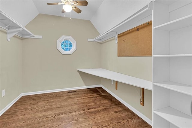 14440 W 187th Ter, Olathe, KS 66062 - walk in closet with a ceiling fan, wood finished floors, and lofted ceiling