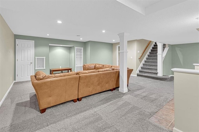 14440 W 187th Ter, Olathe, KS 66062 - living area with carpet flooring, ornate columns, stairway, and recessed lighting