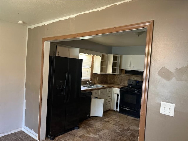 7615 E 48th St, Kansas City, MO 64129 - kitchen featuring black appliances, white cabinets, under cabinet range hood, open shelves, and dark countertops