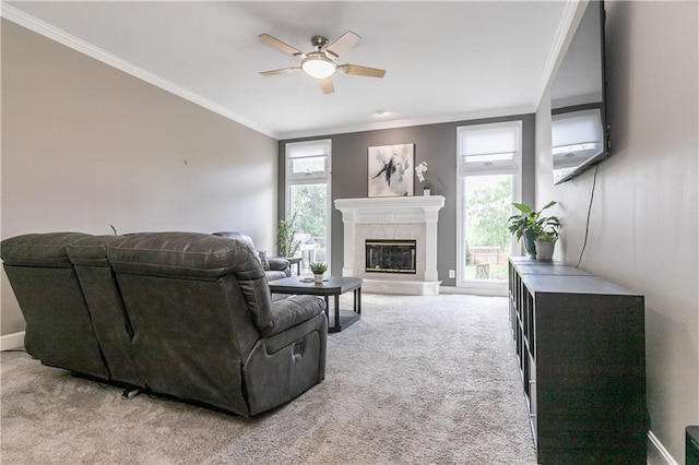 1503 Wrangler Way, Raymore, MO 64083 - living area with carpet, a ceiling fan, ornamental molding, and a fireplace