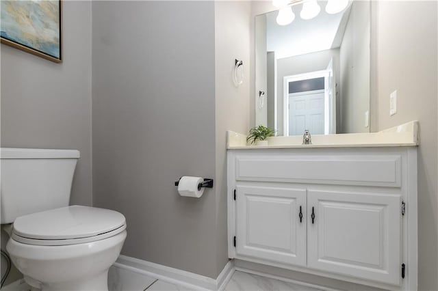 1503 Wrangler Way, Raymore, MO 64083 - half bathroom with vanity and marble finish flooring