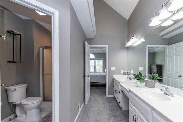 1503 Wrangler Way, Raymore, MO 64083 - full bathroom with double vanity, vaulted ceiling, connected bathroom, and a shower with shower door