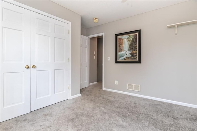 1503 Wrangler Way, Raymore, MO 64083 - unfurnished bedroom featuring carpet flooring and a closet