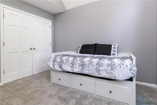 1503 Wrangler Way, Raymore, MO 64083 - bedroom with carpet flooring and a closet