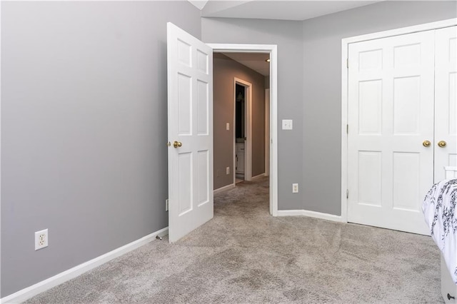 1503 Wrangler Way, Raymore, MO 64083 - unfurnished bedroom with carpet and a closet