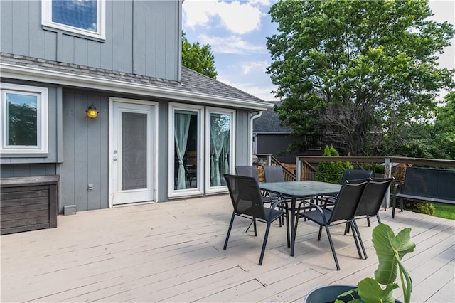 1503 Wrangler Way, Raymore, MO 64083 - deck with outdoor dining space