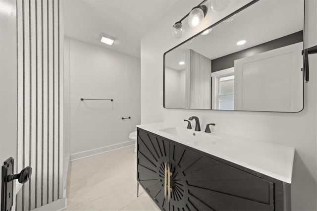 5900 Cherry St, Kansas City, MO 64110 - bathroom with vanity and tile patterned flooring