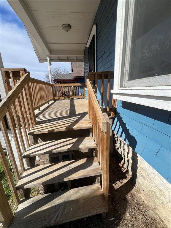 4902 E 17th St, Kansas City, MO 64127 - view of wooden porch