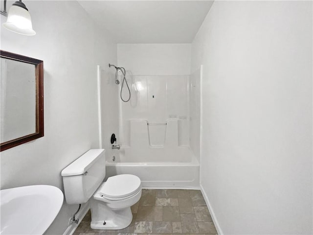 17604 E 19th Street Ct, Independence, MO 64057 - full bathroom with stone finish flooring and shower / bathtub combination