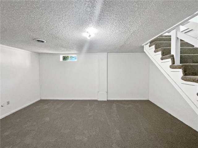 17604 E 19th Street Ct, Independence, MO 64057 - basement featuring carpet floors, a textured ceiling, and stairway