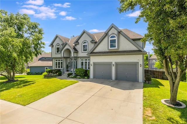 4000 SW Boulder Dr, Lees Summit, MO 64082 - view of front of home with stucco siding and concrete driveway