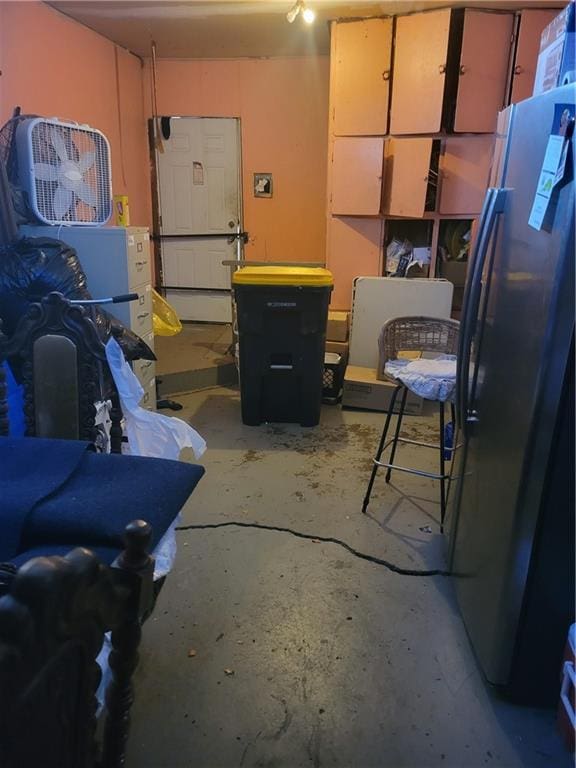 6639 Bales Ave, Kansas City, MO 64132 - garage with freestanding refrigerator