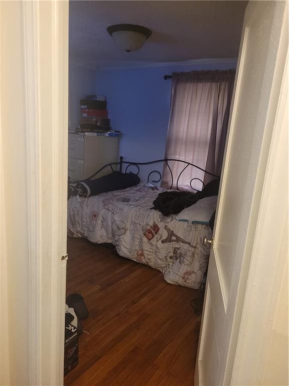 6639 Bales Ave, Kansas City, MO 64132 - bedroom featuring wood finished floors