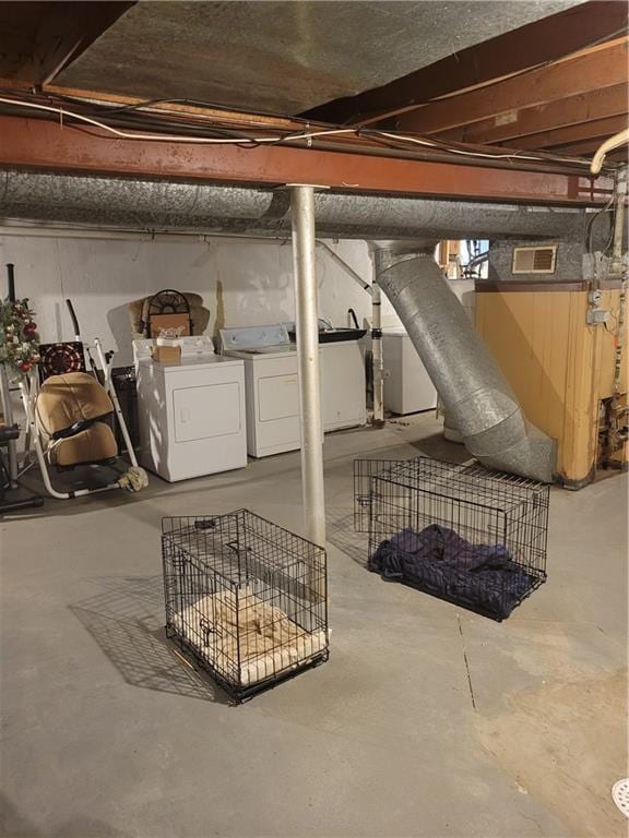 6639 Bales Ave, Kansas City, MO 64132 - unfinished basement with separate washer and dryer