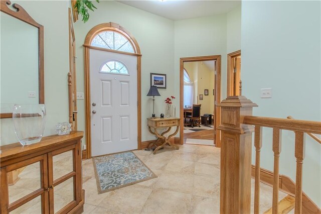 22604 Vincent St, Peculiar, MO 64078 - foyer entrance featuring light tile patterned floors